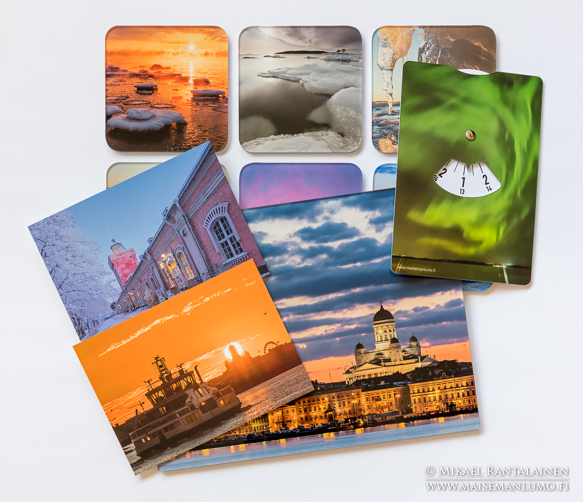 Helsinki postikortteja, lasinalusia, parkkikiekkoja ja tauluja.